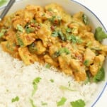 a bowl of Thai coconut curry served over rice