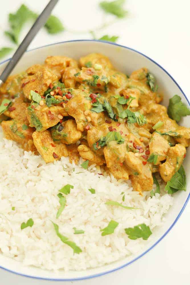 a bowl of Thai coconut curry served over rice