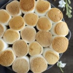 overhead image of toasted marshmallows on top of s'mores dip.