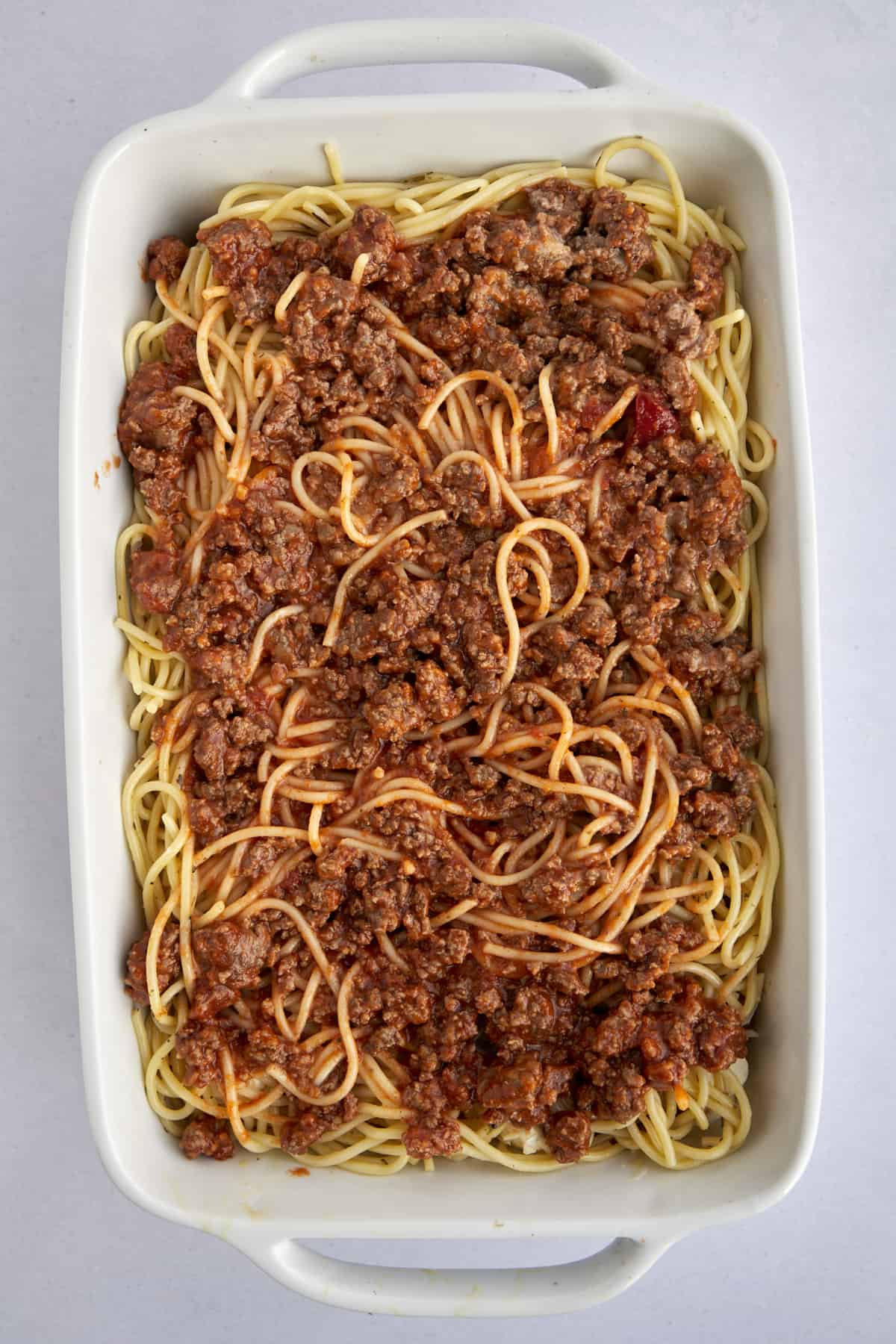 spaghetti noodles topped with marinara.