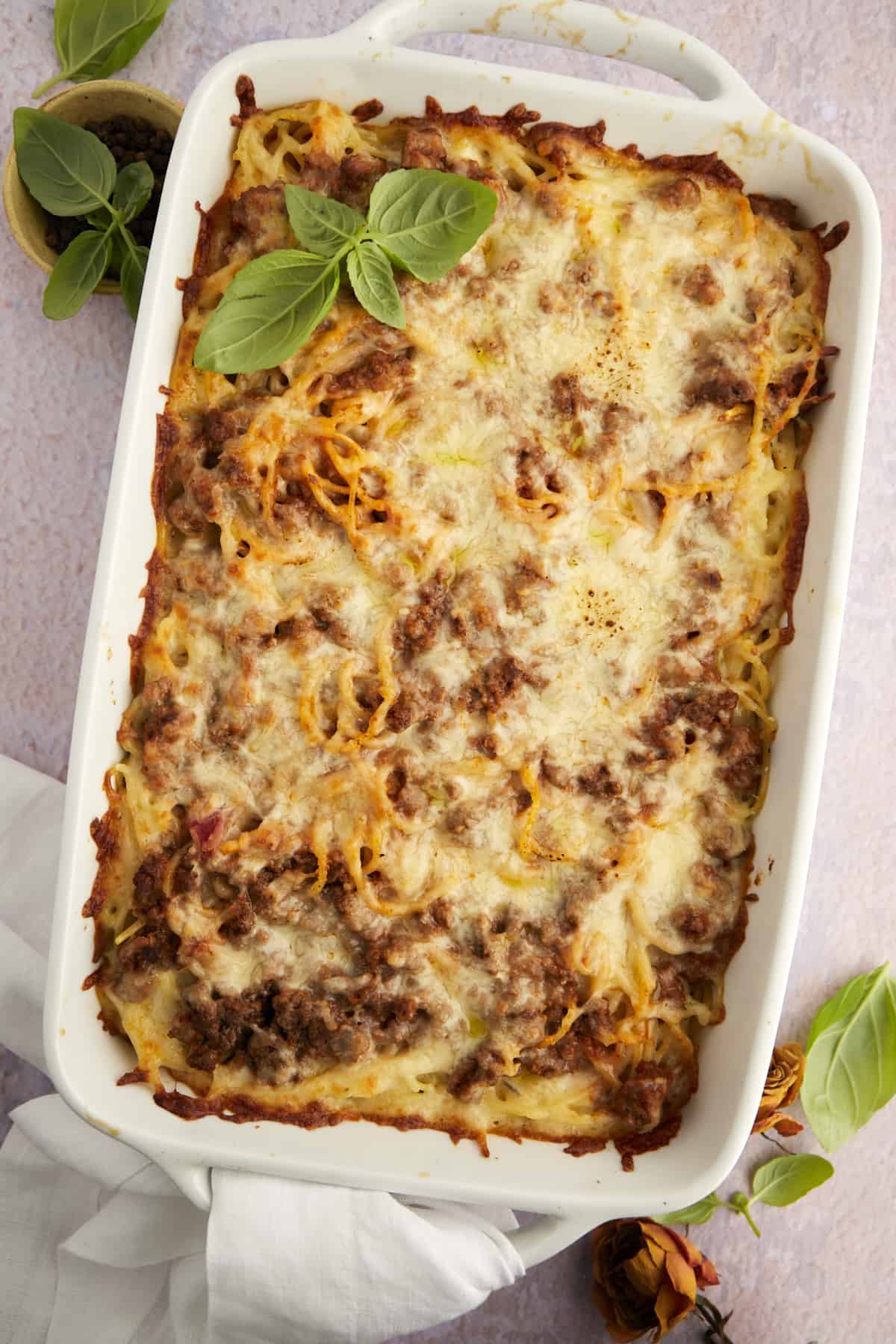 a casserole dish full of easy baked million dollar spaghetti.