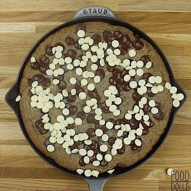 Overhead image of an Oreo skillet cookie topped with dark and white chocolate chips.