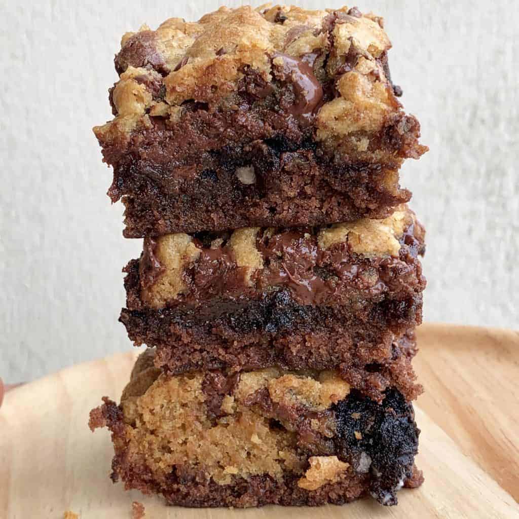 Three Oreo brookie bars stacked on top of each other.