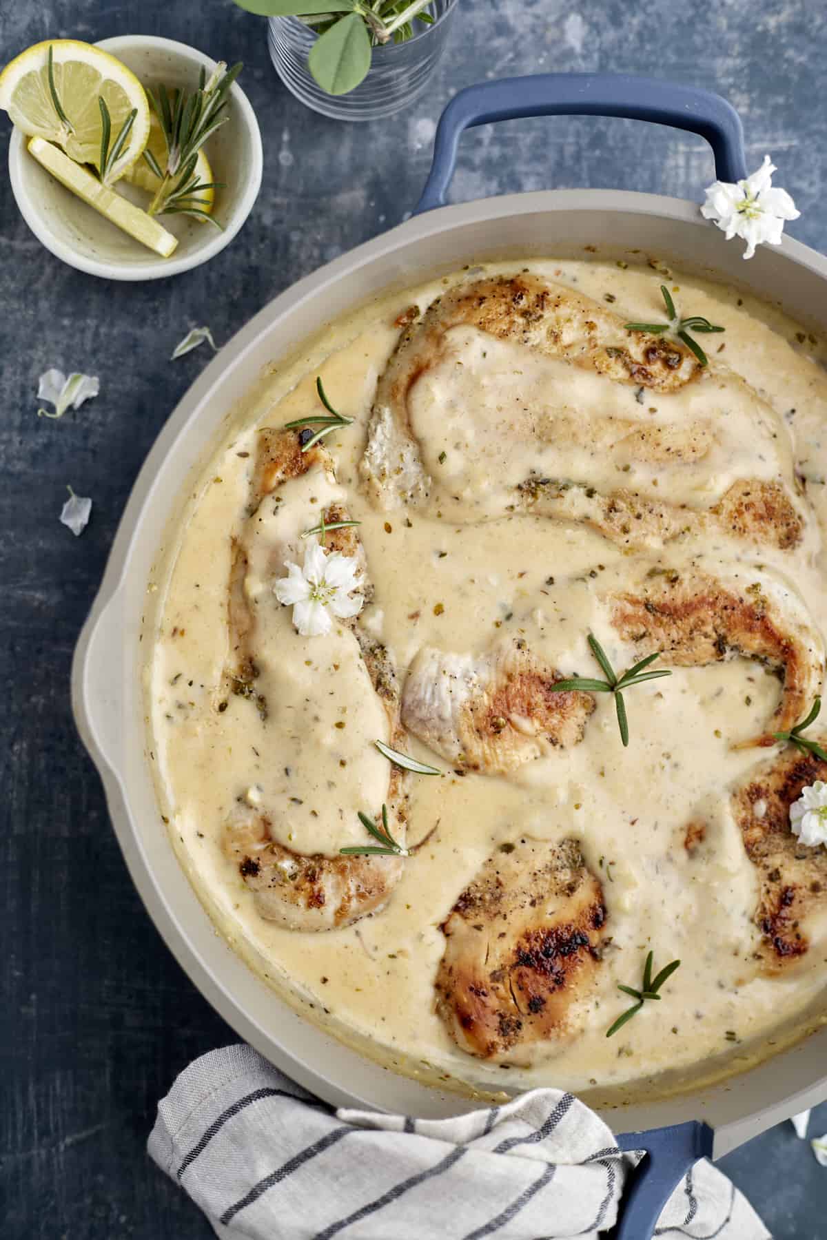 creamy herb chicken in a pot.