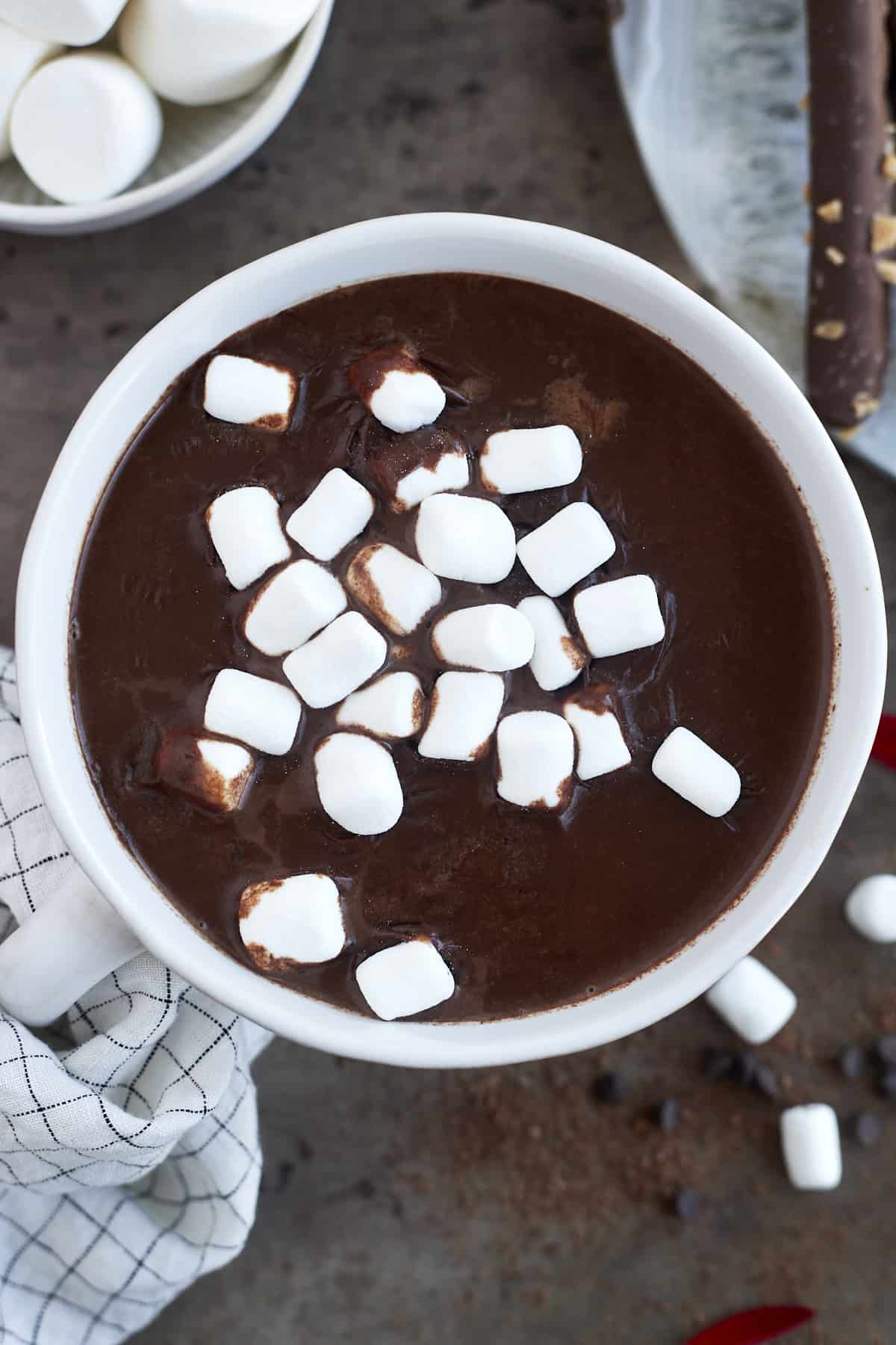 A mug of hot chocolate with espresso topped with marshmallows. 
