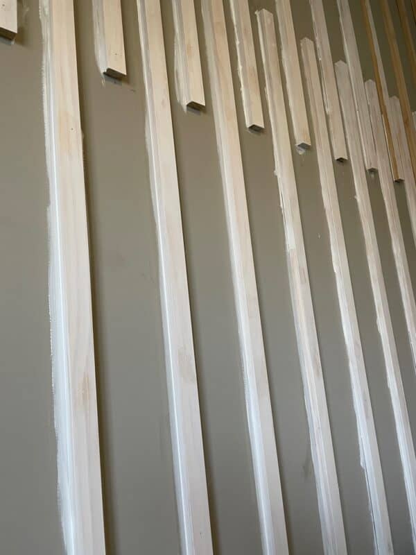 white painted wood planks of a wall