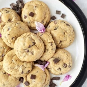 a plate of peanut butter chocolate chunk cookies