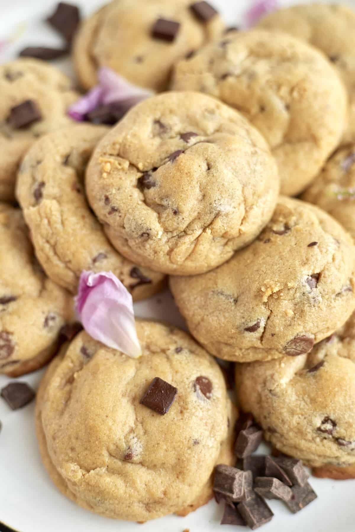 close up image of a pile of peanut butter chocolate chunk cookies.