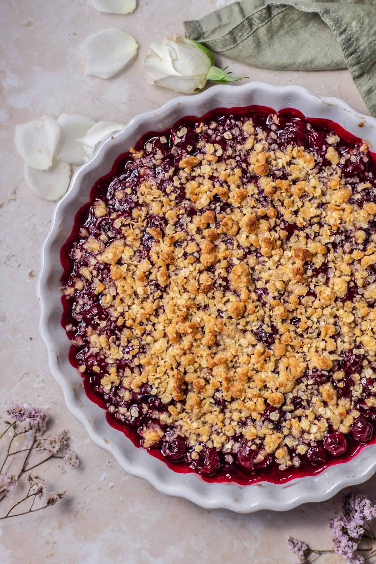 overhead image of a baked cherry crisp 