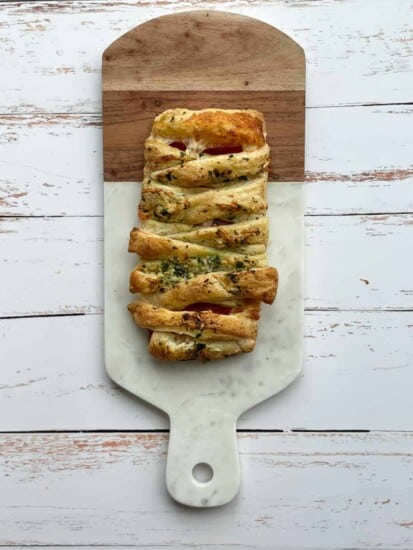 pizza pastry braid on a serving board