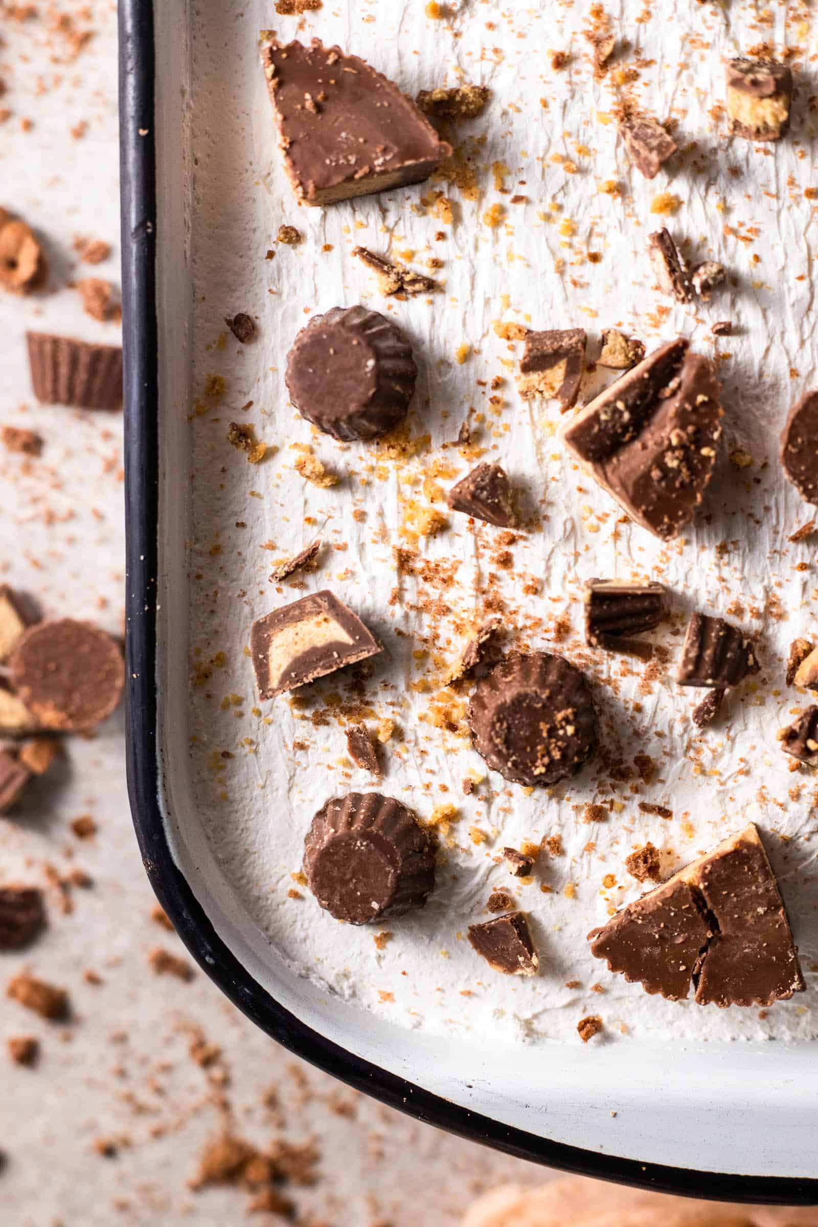 close up image of a no-bake dessert topped with peanut butter cups