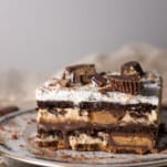 a slice of chocolate peanut butter lasagna on a plate