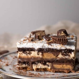 a slice of chocolate peanut butter lasagna on a plate