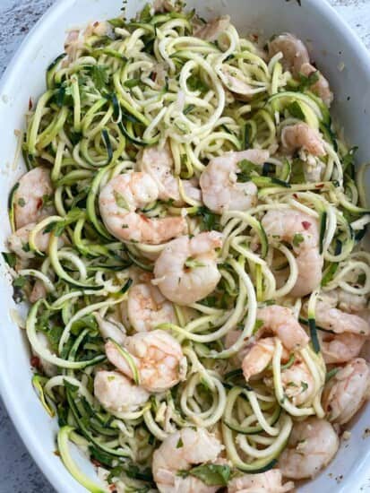 healthy shrimp scampi with zucchini noodles in a baking dish