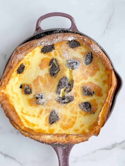 Overhead image of an Oreo dutch baby pancake in a skillet.
