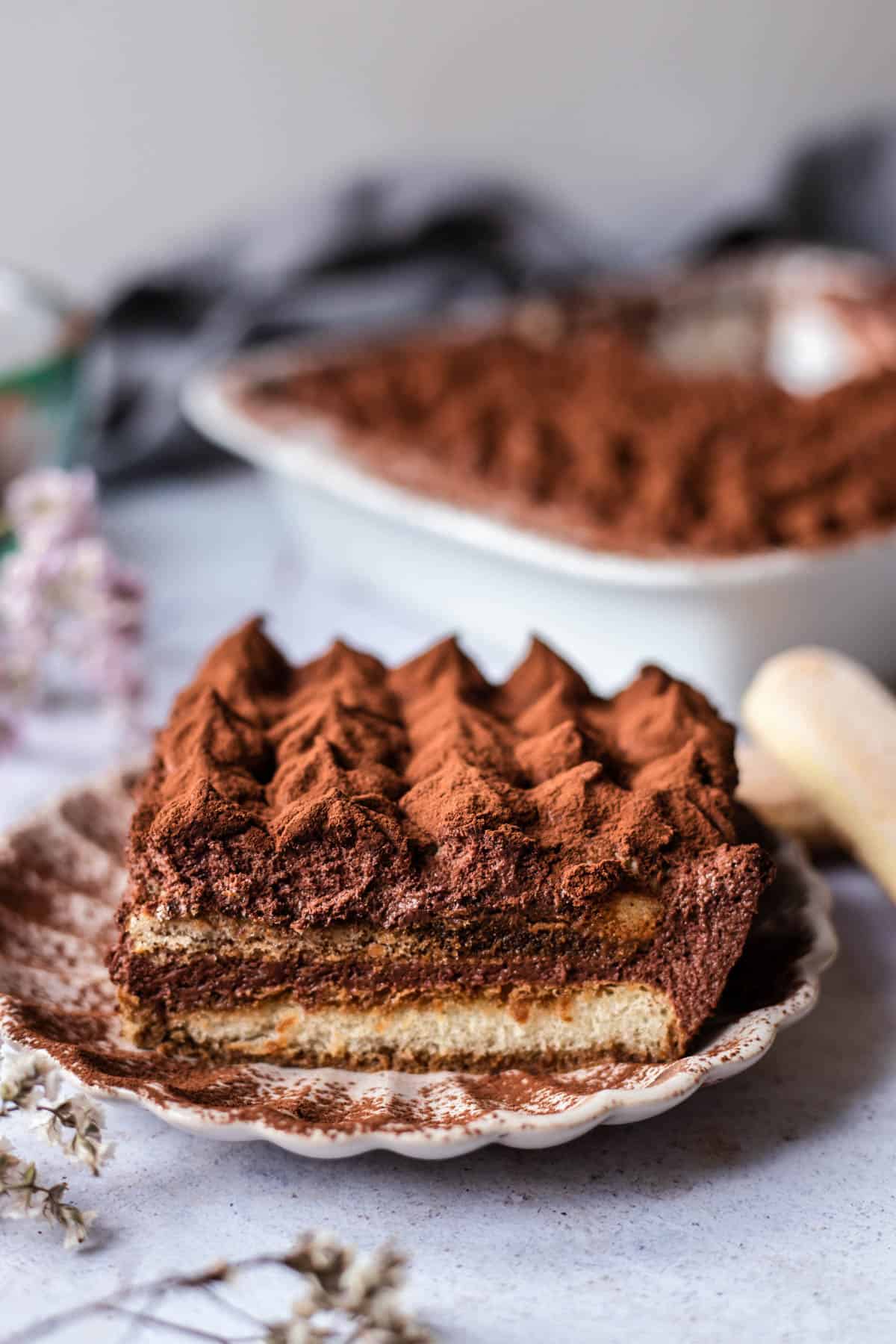 side image of a slice of easy chocolate tiramisu on a plate