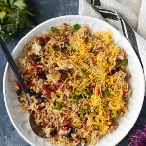 a bowl of easy Mexican rice with cheese and veggies