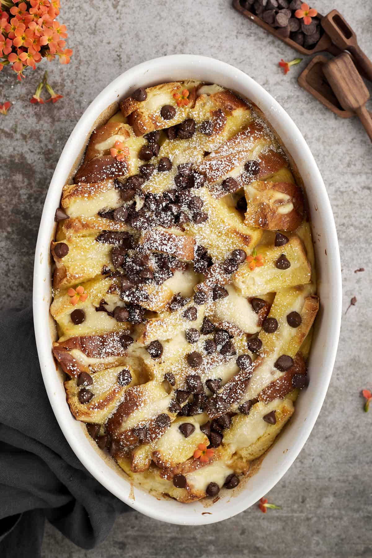 overhead image of an oval baking dish of cannoli baked french toast