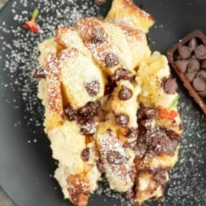 a serving of cannoli baked french toast on a plate