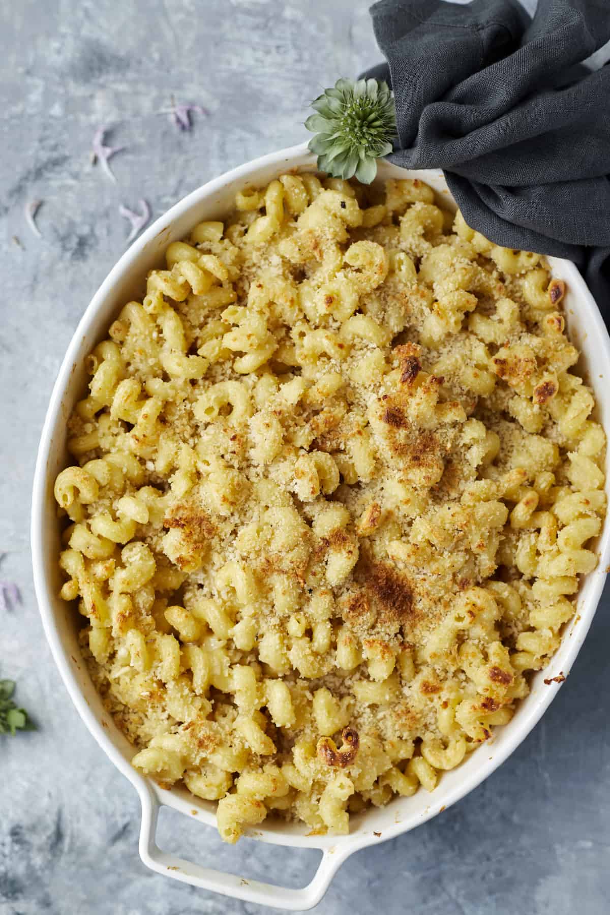 a dish of easy baked mac and cheese topped with breadcrumbs.