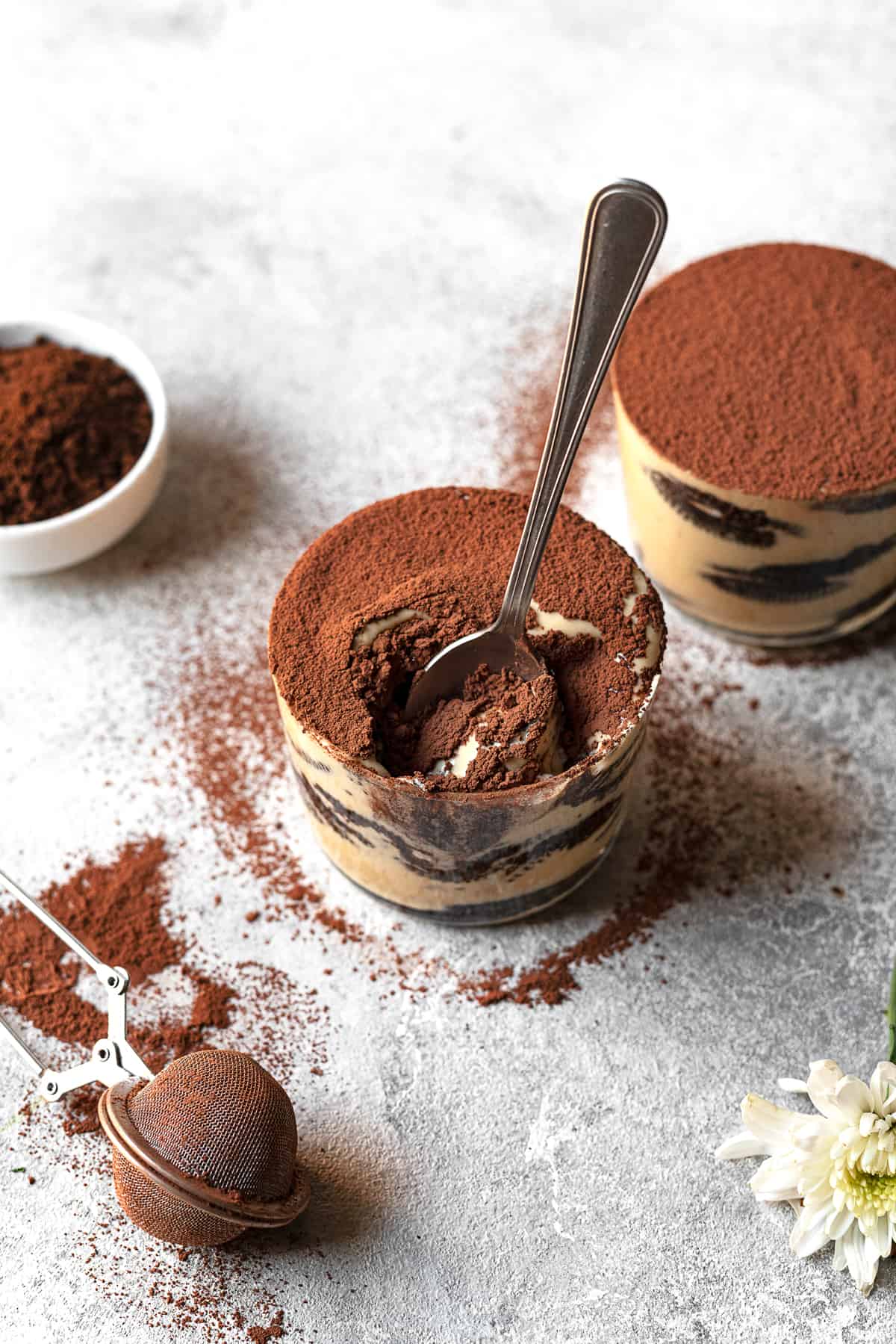 a spoon dipping into a jar of Oreo tiramisu