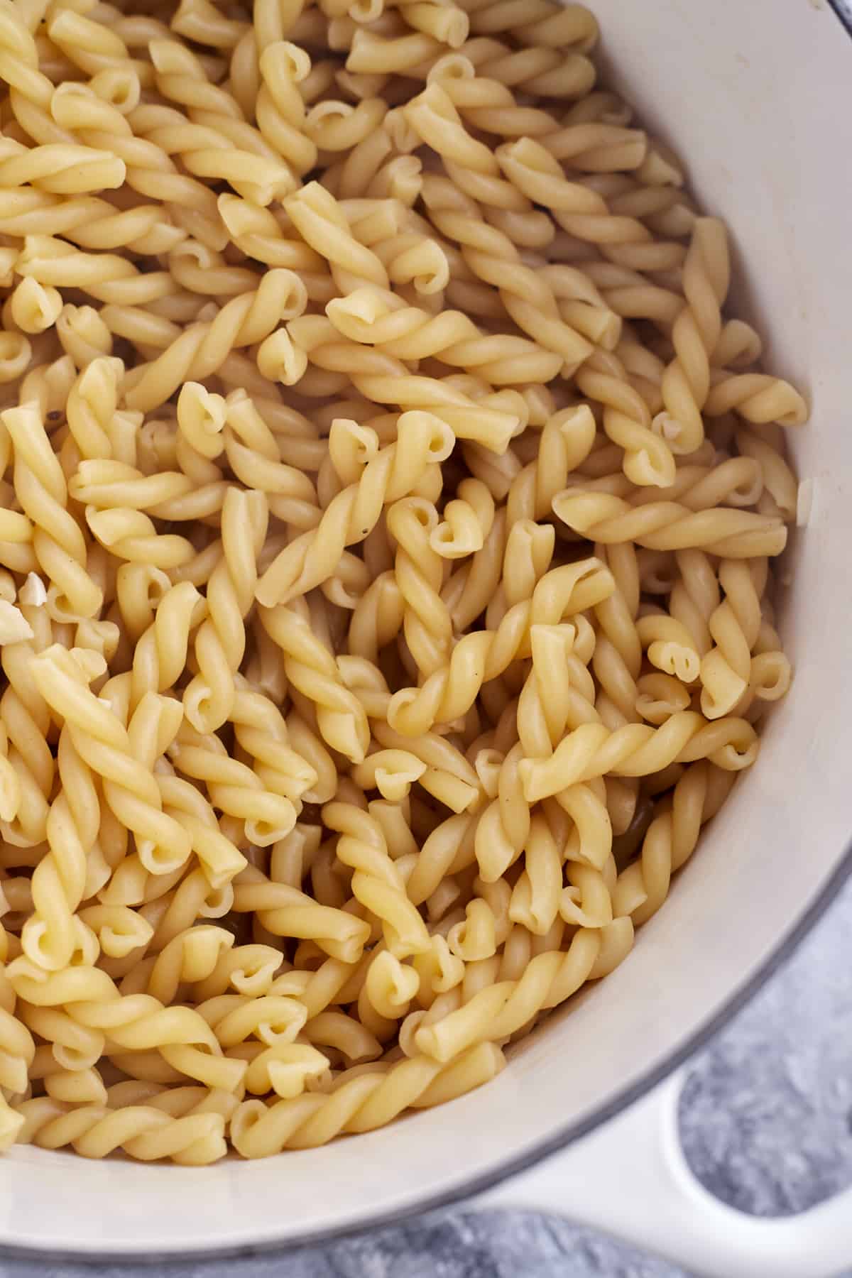 uncooked pasta noodles in a pot