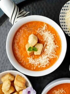Roasted Tomato Soup with Parmesan Croutons close up.