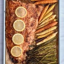 overhead image of sheet pan salmon with vegetables.