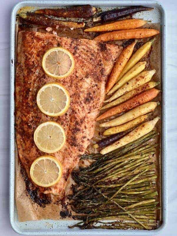 overhead image of sheet pan salmon with vegetables.