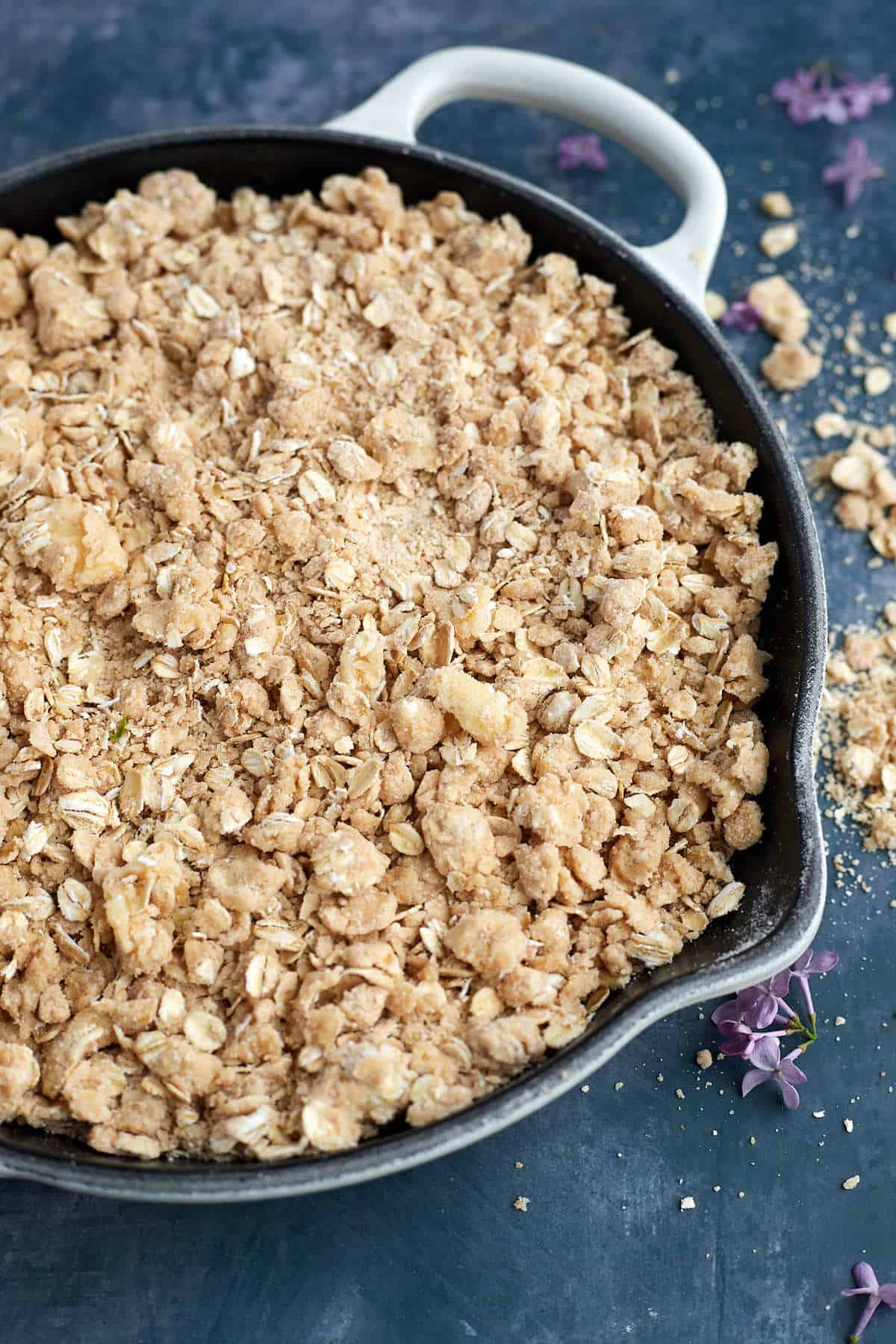 overhead skillet of oat crumble before baking