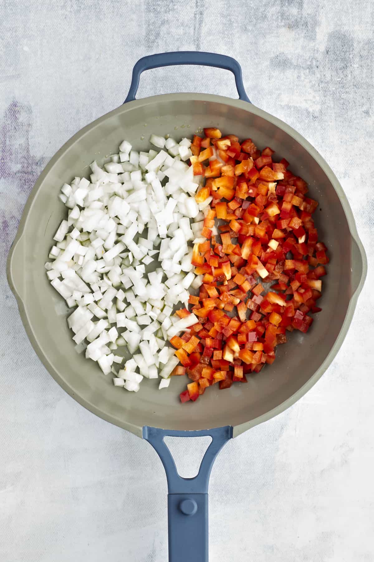 onions and peppers in a large pot