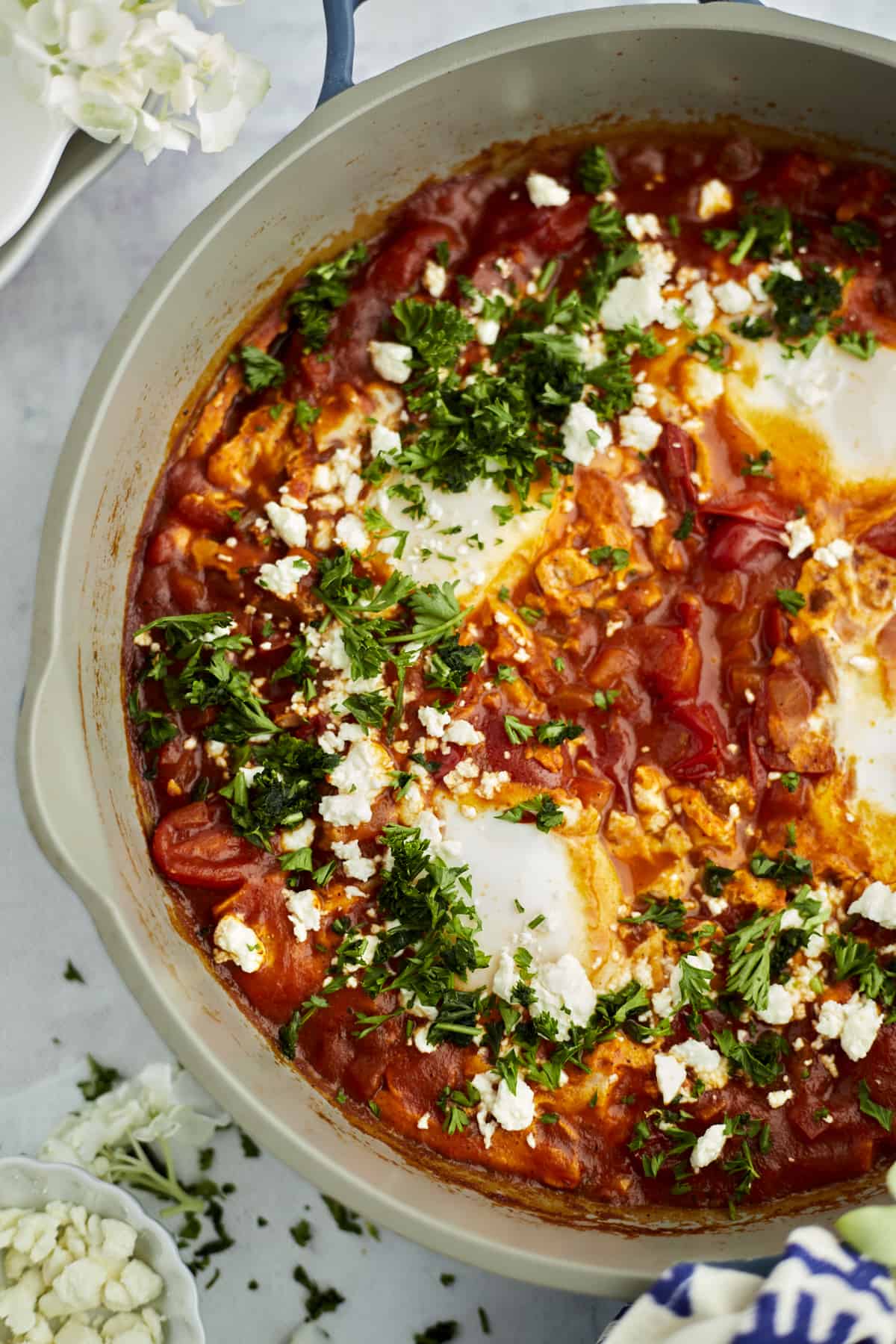 a skillet with shakshuka with feta