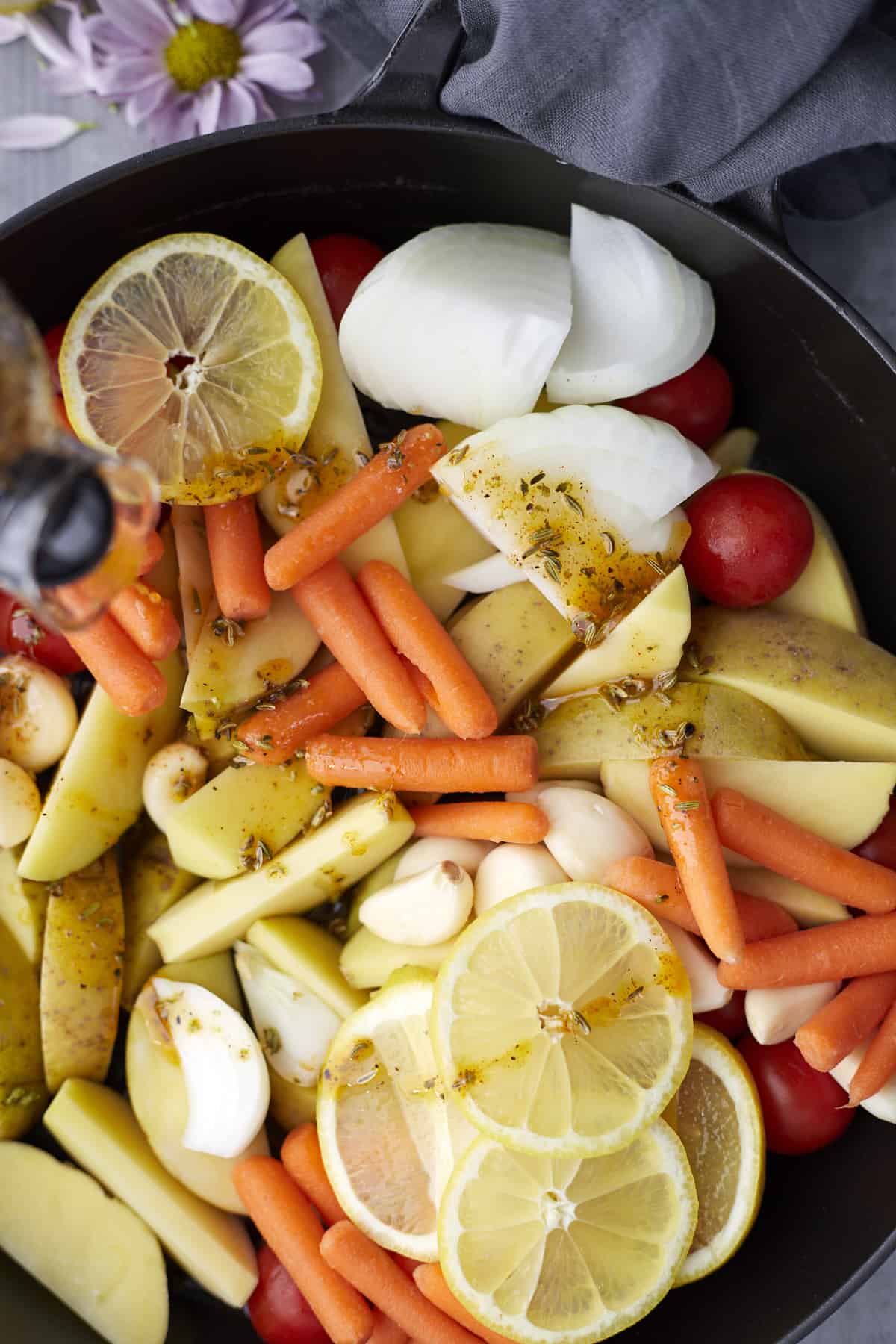 overhead marinated vegetables in a cast iron pan