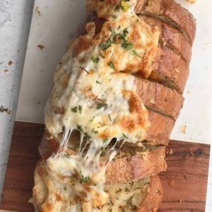 overhead image of a loaf of cheesy garlic bread