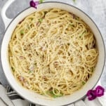 overhead image of spaghetti carbonara in a white pot