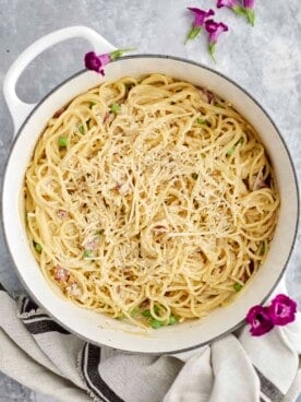 overhead image of spaghetti carbonara in a white pot