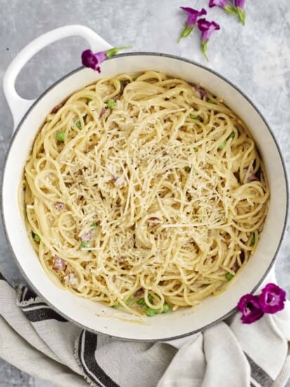overhead image of spaghetti carbonara in a white pot