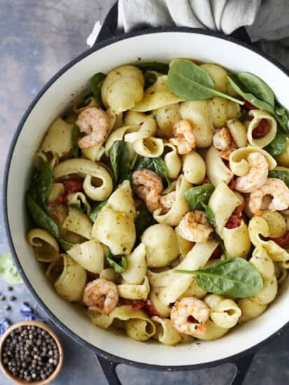 overhead image of a one pot pesto pasta with oven baked shrimp