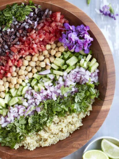 Overhead image of a Mediterranean quinoa salad in a bowl.