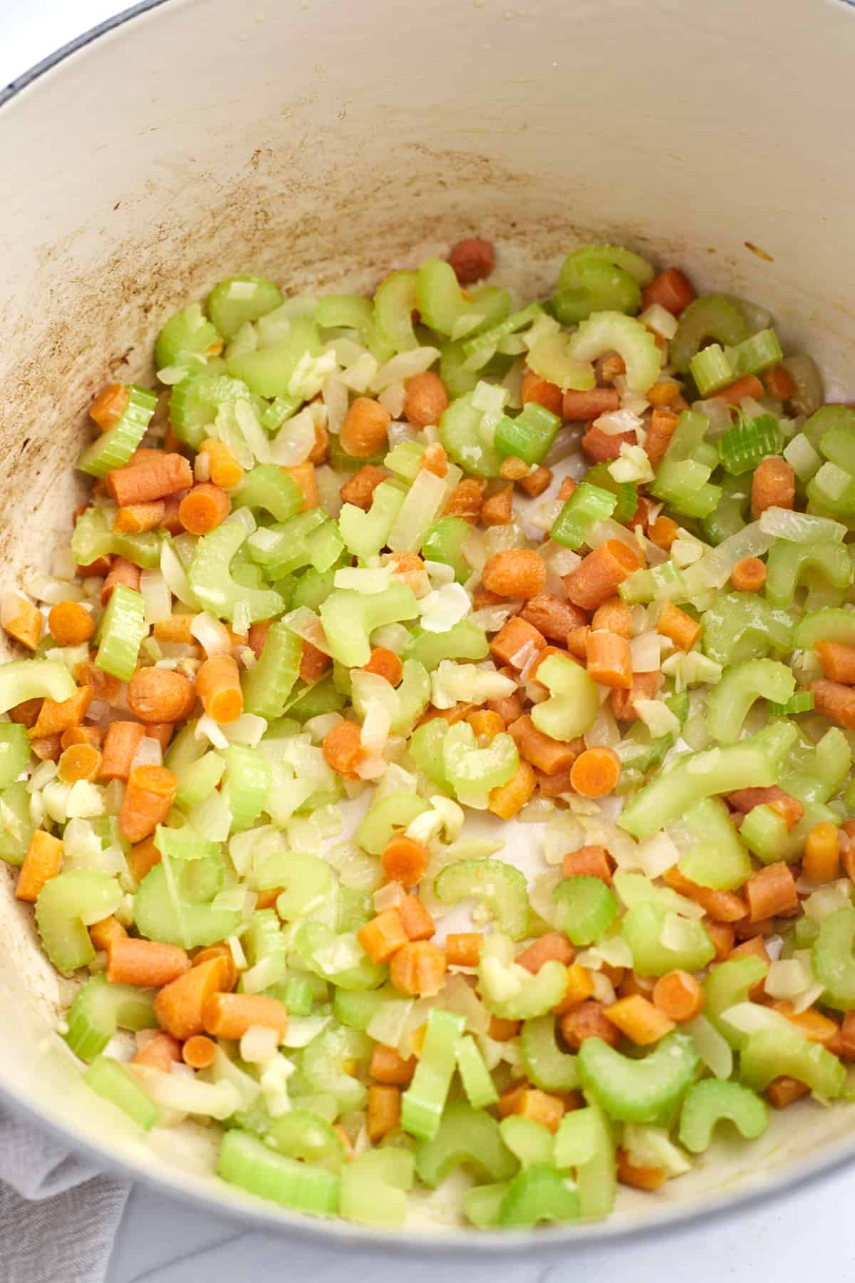 dutch oven of celery and carrots and onions