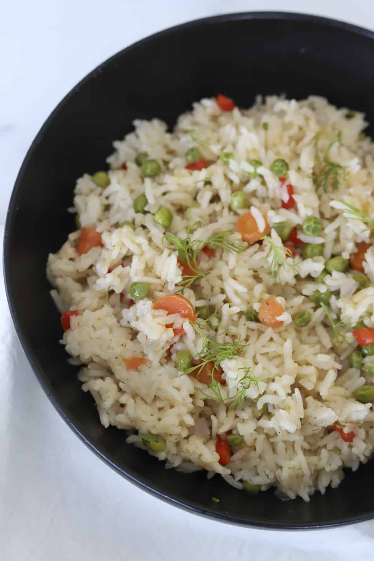 plated veggie rice with fresh dill