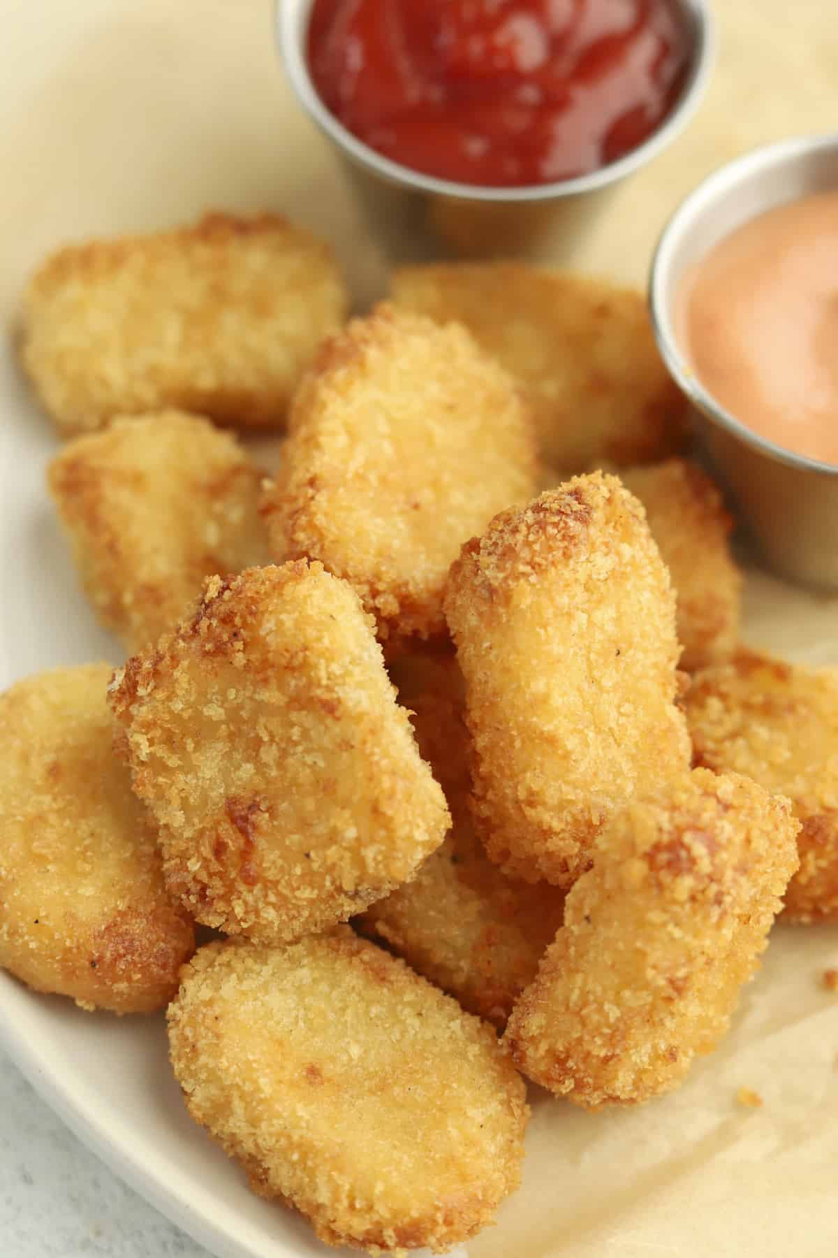 air fryer potato nuggets side view with ketchup