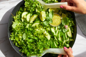 A bowl of green goddess salad.