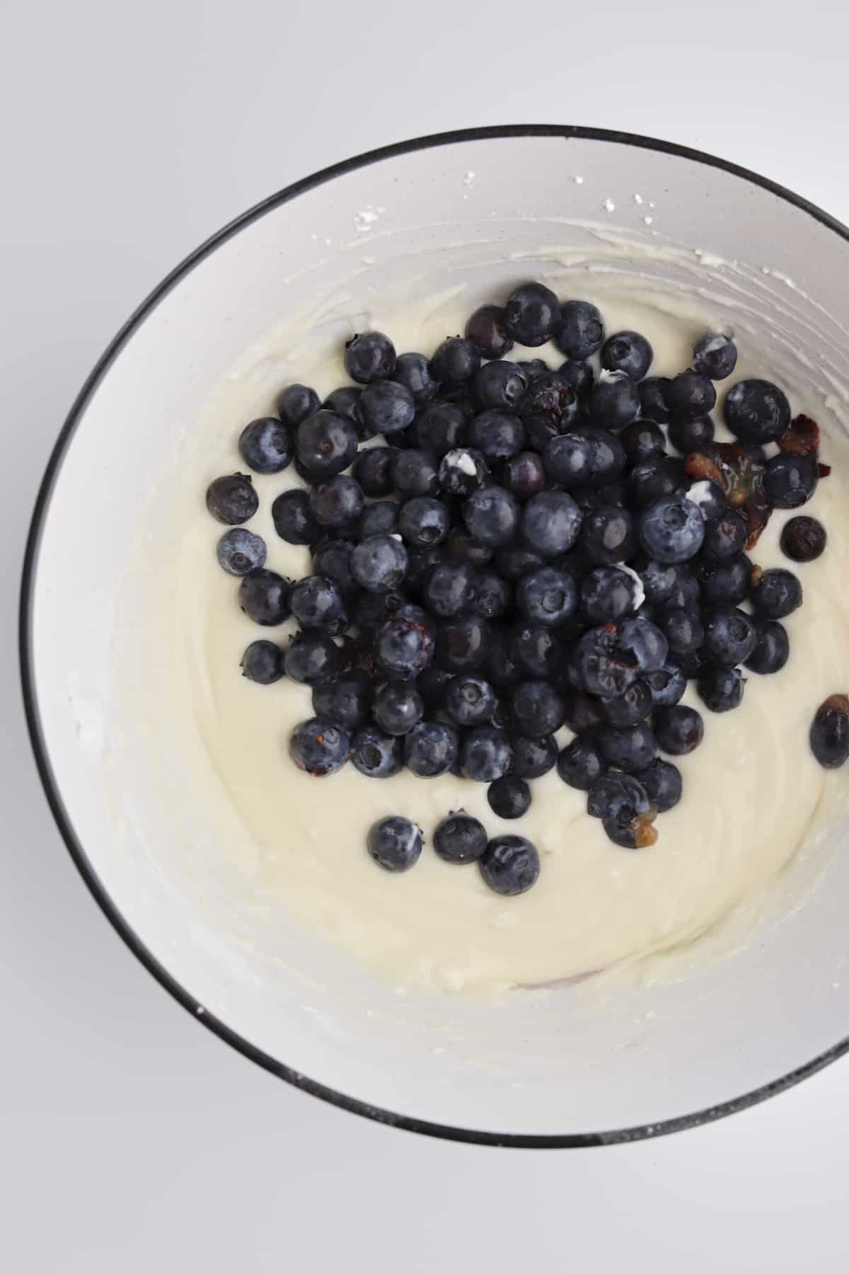 cream cheese filling with fresh blueberries in a bowl