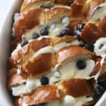 blueberry mascarpone french toast in an oval baking dish