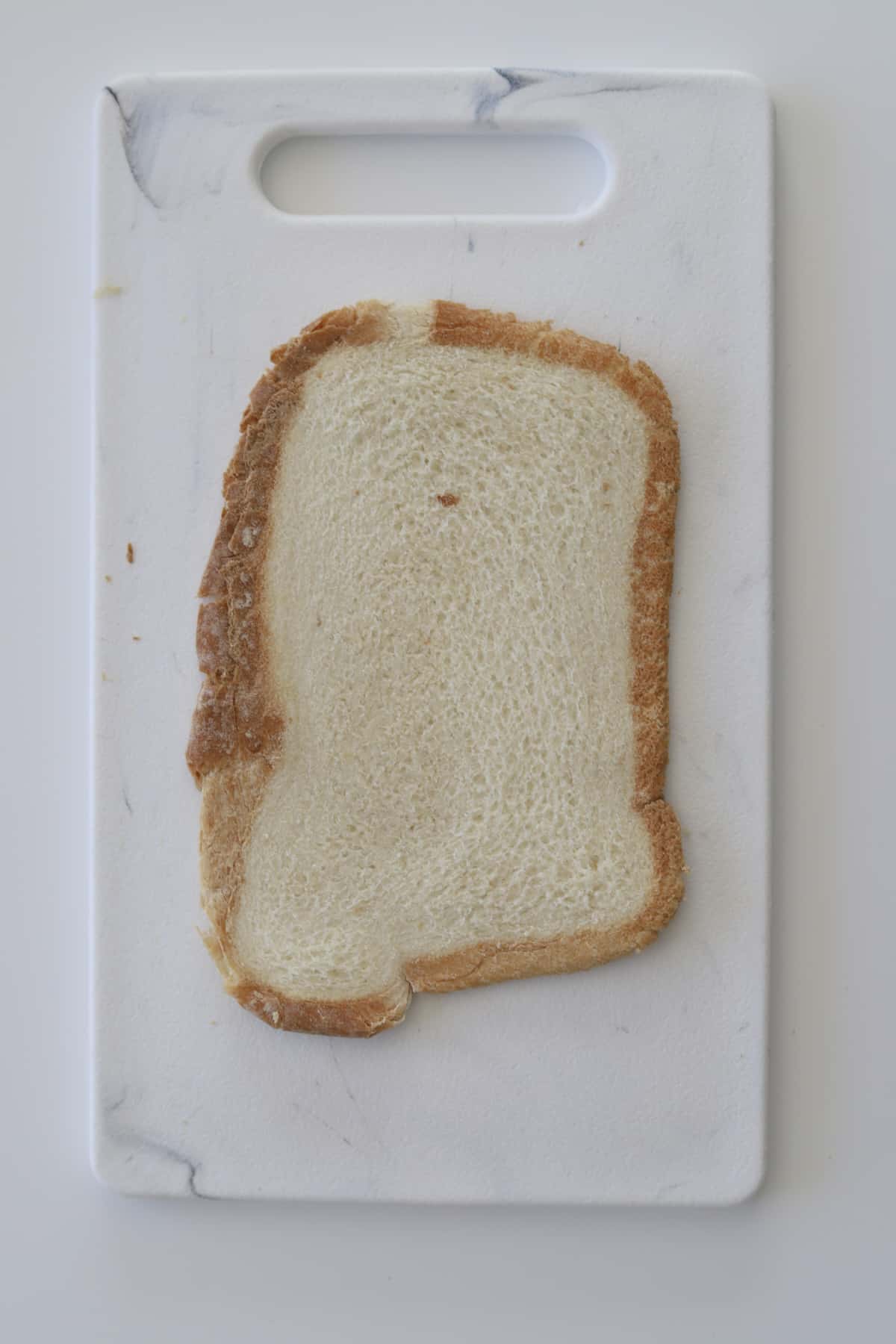 a flattened piece of bread