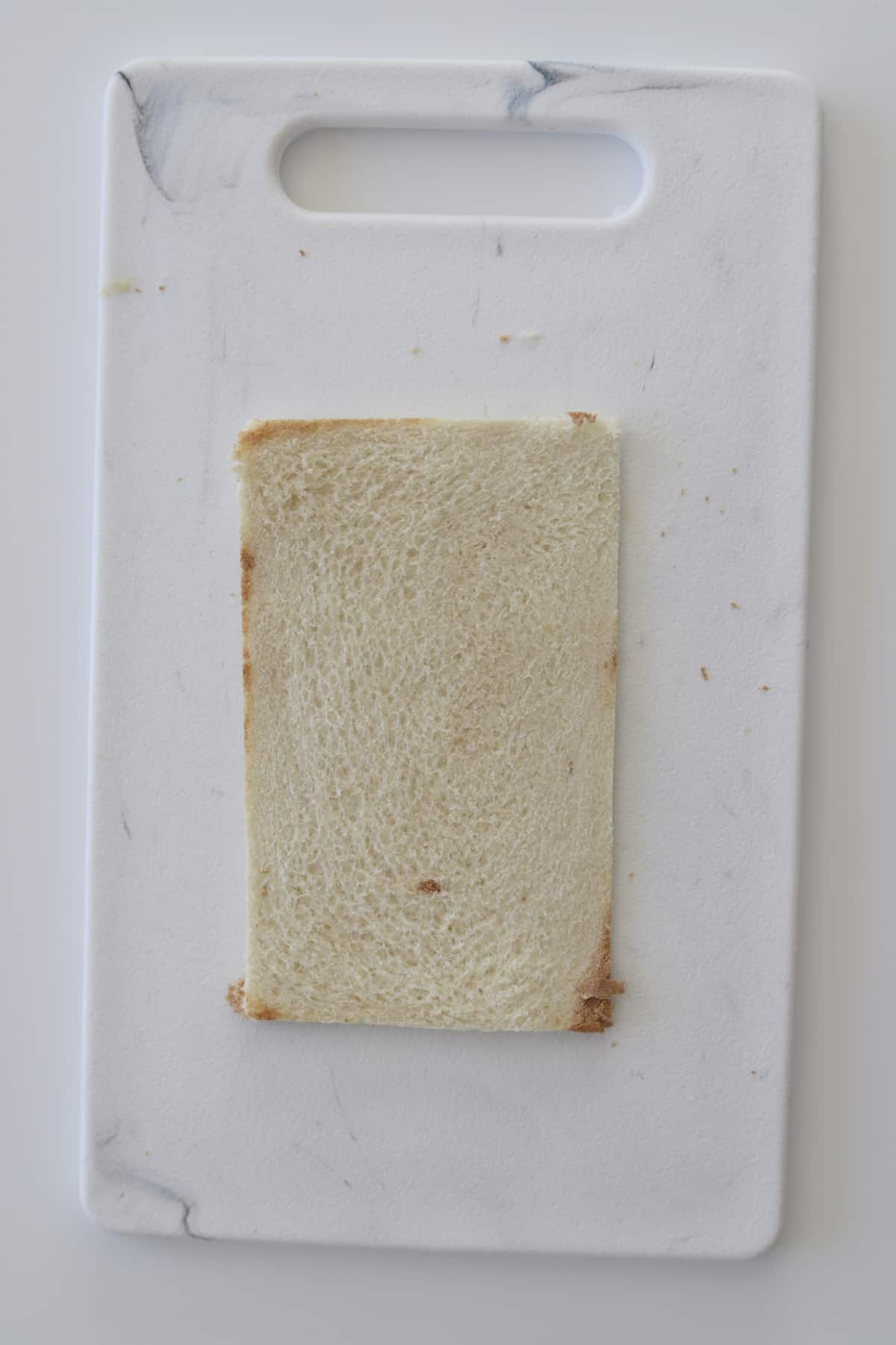 flattened bread with the crust missing