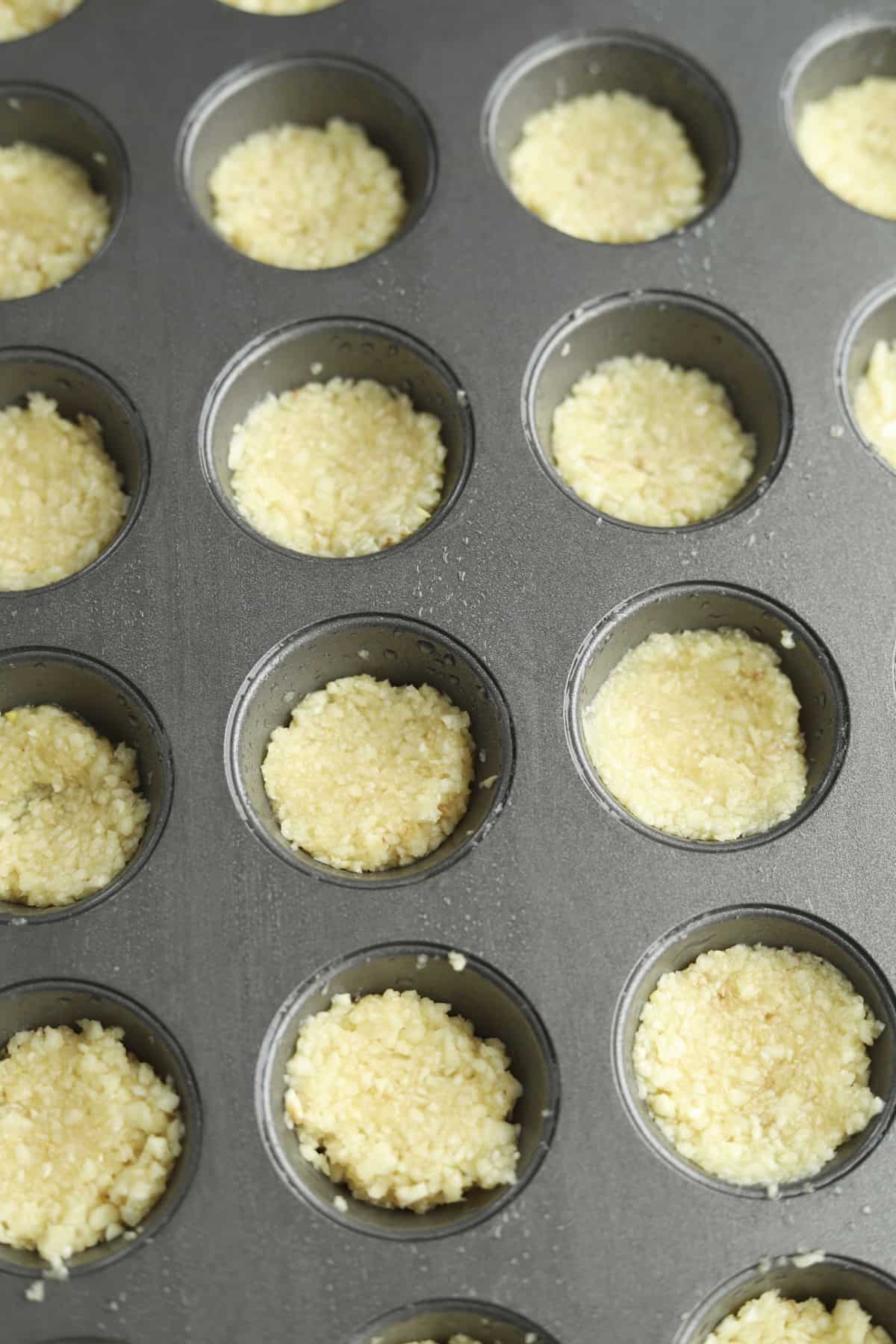 garlic in a mini muffin tin