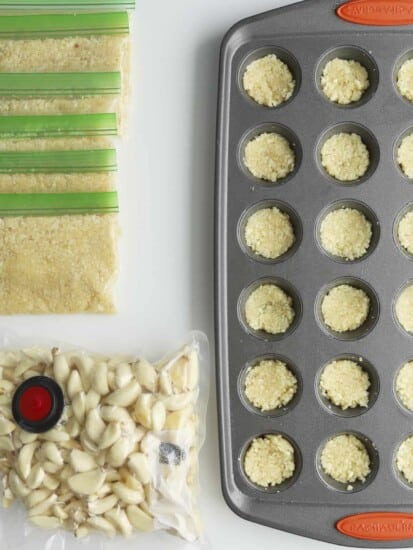 mini muffin tin of garlic, ziploc bags of garlic and vacuum sealed bag.