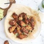 a bowl full of crispy air fryer chicken wings